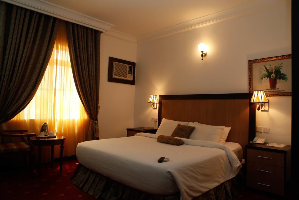 Immaculate Suites And Apartments Mobushipe Kamer foto